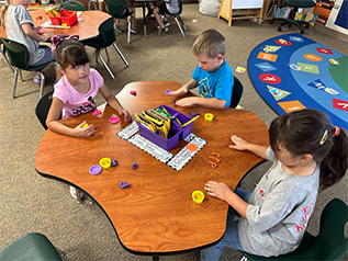 Little children playing outside