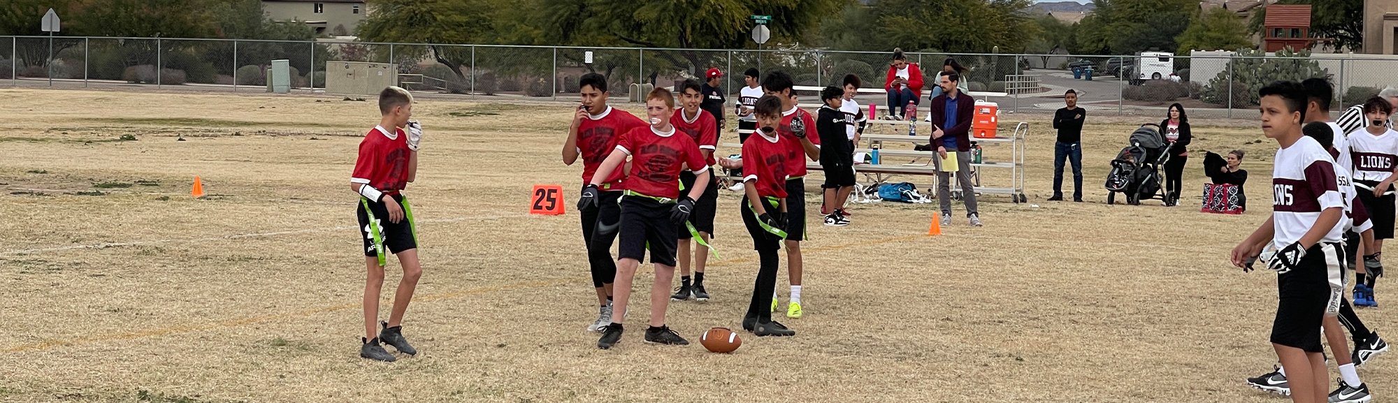 students playing football
