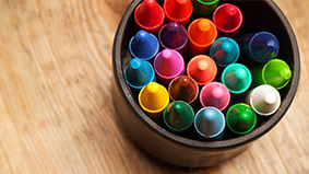 Colored crayons in a can